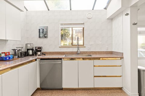 Kitchen sink with a window, allowing plenty of natural light
