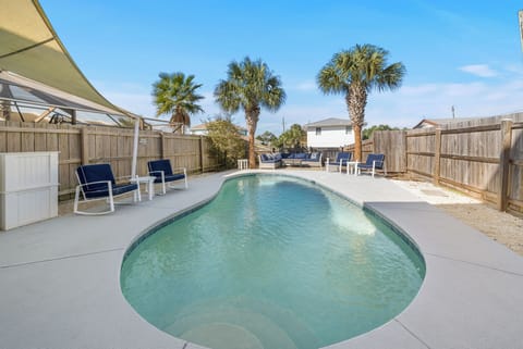 Optionally heated outdoor private pool and fenced in backyard