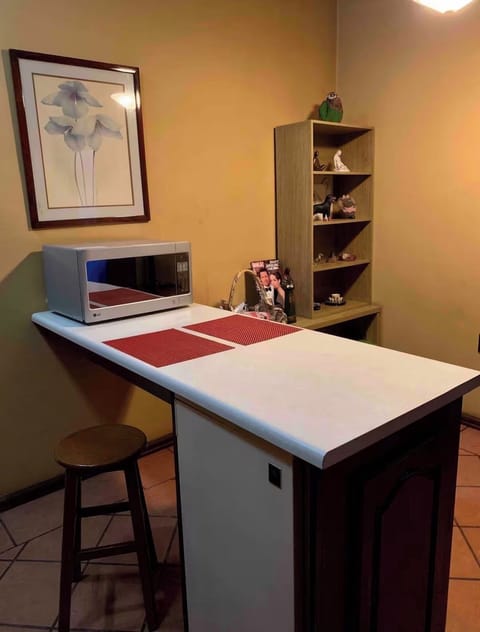 Mini fridge, dinning table and essentials.
