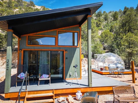 Modern tiny cabin with private deck and unique outdoor stargazing dome retreat