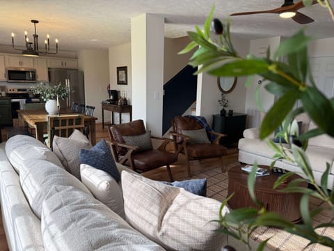 Open concept living room, dining and kitchen area