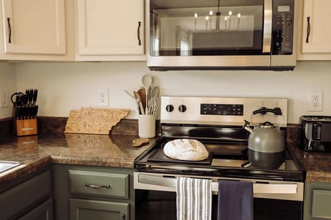 Fully stocked kitchen making it ideal for home-cooked meals during relocation or extended visits