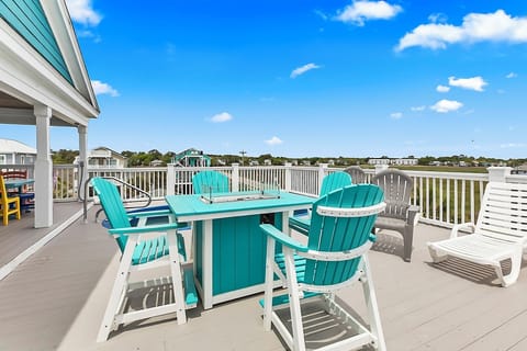 Enjoy the perfect evening on your own deck with unbeatable views, ample seating, and a firepit!