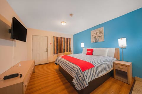 Relax after exploring with TV time and cozy bedding.