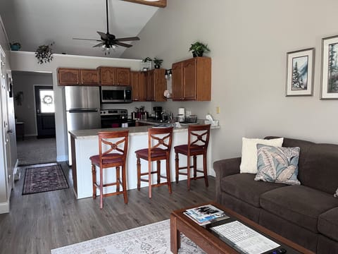kitchen/ living area with bar seating