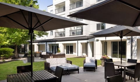 Sip drinks in the shade on the sunny outdoor patio.