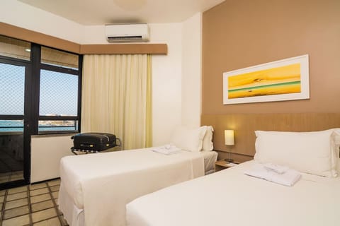 Rest comfortably in twin beds with cool air-conditioning.