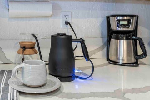 Ground coffee, sugar, and creamer provided