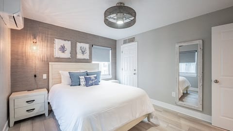 Wake refreshed in a bright bedroom with airy coastal style.