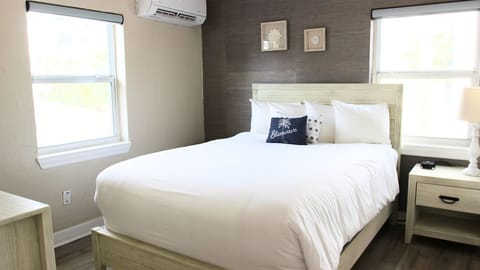 Unwind into crisp linens and peaceful, beachy comfort.