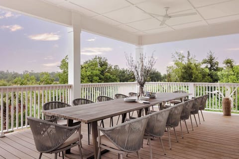 Balcony | Upper Level | Outdoor Dining Area | Cornhole Setup