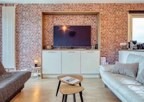 Salon avec canapé-lit