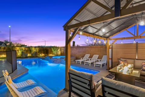 Enjoy Lounging on the in-pool loungers or on the sofas next to the firepit.  In the winter, enjoy snow-capped mountain views in the distance.