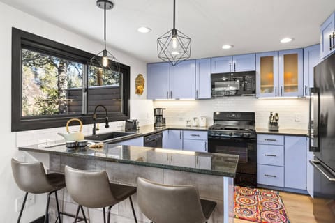 The kitchen is fully stocked with everything you need to cook a meal or just hang out by the bar and enjoy the views!