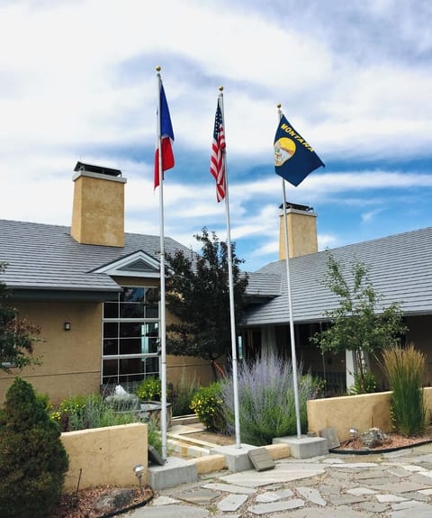 The front entrance welcomes guests. Lots of parking available.