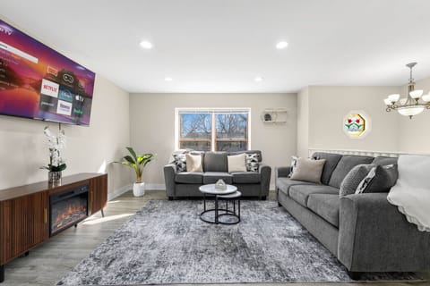 Bright and inviting living area with comfortable seating and natural light