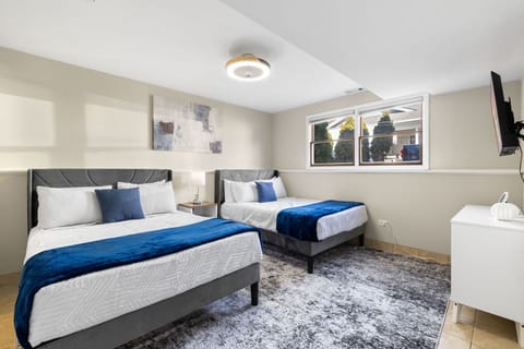 Peaceful bedroom featuring a soft and comfortable double bed