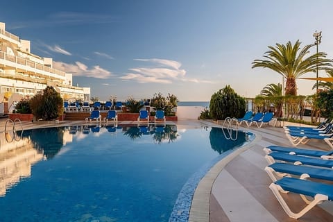 Dive into crystal-blue waters and bask beside palm trees.