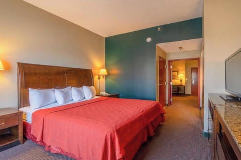 Unwind after adventures in a spacious, softly lit bed.