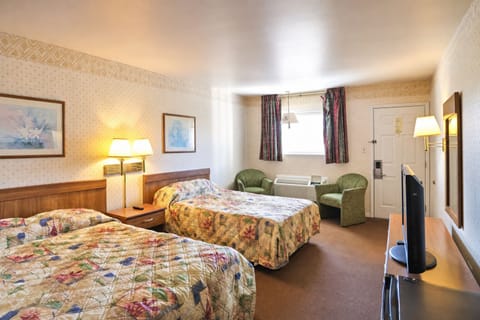 Settle into a spacious room with two comfy beds.