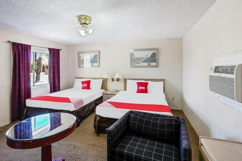 Settle in with two comfy beds and cool A/C.