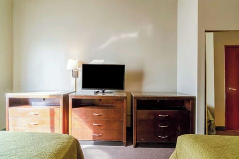 Store luggage neatly and enjoy convenient in-room entertainment
