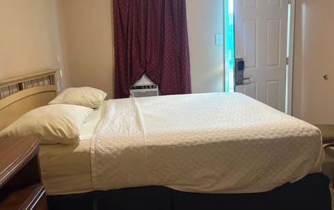 Unwind in a cozy bed with easy private entry.