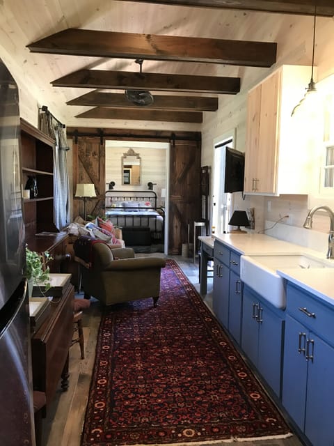 Living area with original exposed beams.