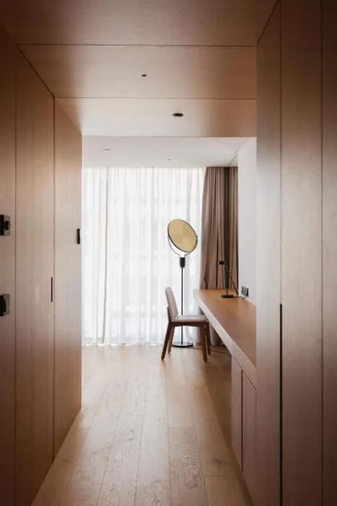 Focus at the sleek desk with calming daylight streaming in.