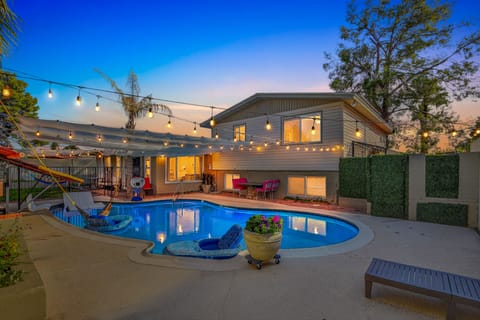 Inviting backyard pool designed for relaxation & play, making it a highlight.