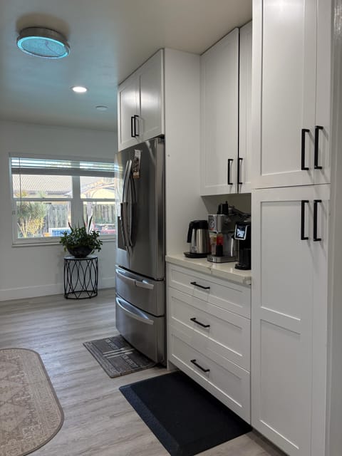 Kitchen: newly redesigned 026. overlooks backyard and pool area