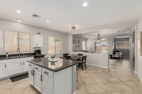 Large Granite prep island and 2 barstools