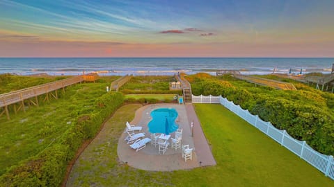 Oceanfront View of backyard and pool from top balcony.