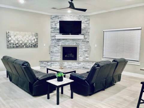 Bright open living room featuring a smart TV