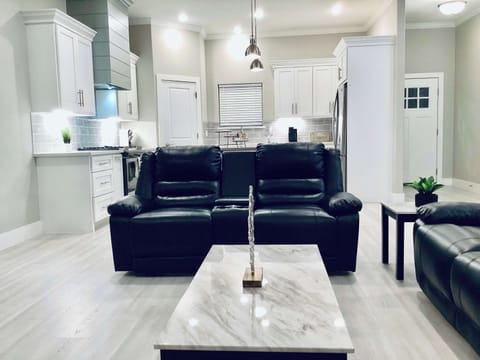 Bright open living room featuring a smart TV