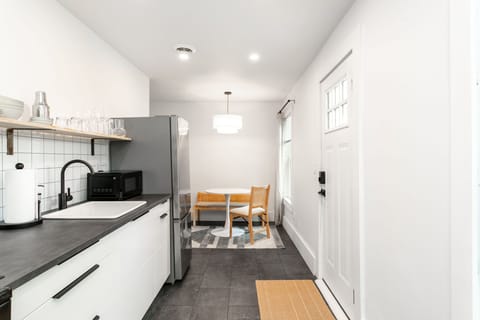 Cozy dining nook just off the kitchen, perfect for a casual meal.