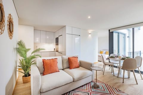 Living room with sofa-bed, TV, AC and Dining table.
Fully equipped kitchenette.