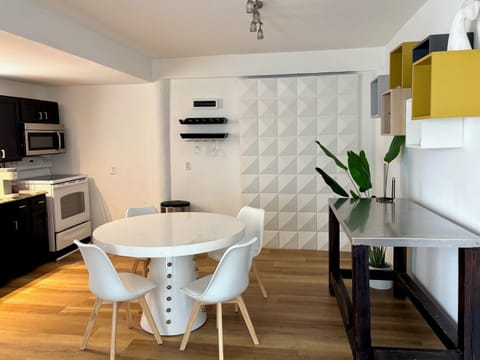 The downstairs also has a full kitchen and small dining space.