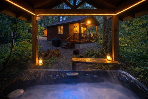 Cozy outdoor hot tub retreat surrounded by tranquil forest
