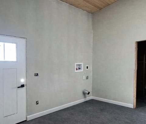 Large utility area near the side door allows for washer/dryer and storage!