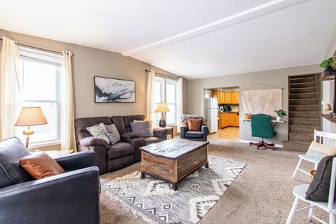 [Living room, main floor] The stairs shown here lead to bedroom three. Please us