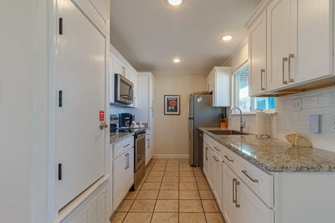 Bright, fully equipped coastal kitchen