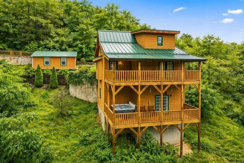 Beautiful multi-level cabin nestled in the trees with spacious decks and classic mountain charm. Surrounded by nature, this cabin offers peaceful views and a true Smoky Mountain retreat.