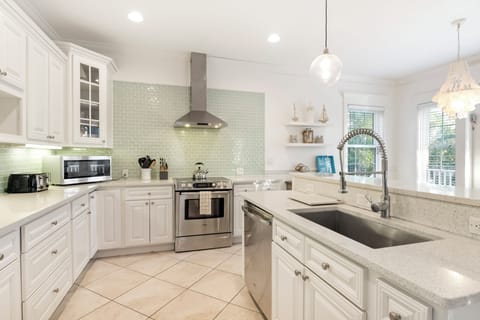 Spacious counters and modern appliances keep meal prep smooth and stress-free.