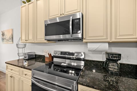 Well stocked kitchen with full size appliances and plenty of workspace