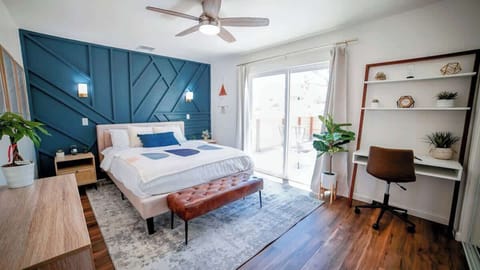 Master bedroom with private patio, work from home space and comfortable memory foam mattress!