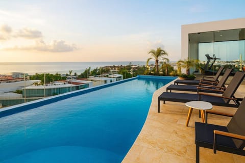 The rooftop pool will give you plenty of sun, a warm Caribbean breeze, and a breathtaking view.