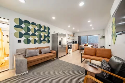 Welcome to our open living room/dining room.