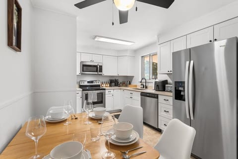 The kitchen has new cabinets, stainless steel appliances, and everything you need to enjoy a home-cooked meal
