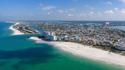 Aerial view showing the unit`s location just steps from the St. Pete Beach shoreline.